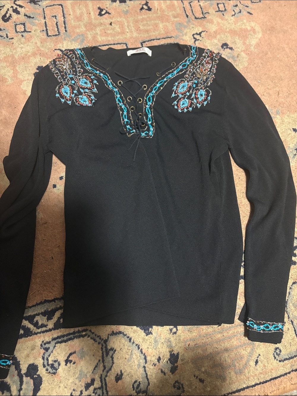 Red Brand Black Lace-Up Long Sleeve Top with Turquoise Accents